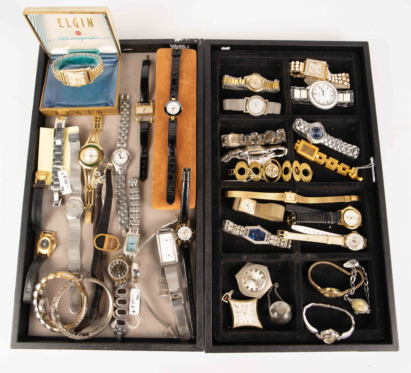 36 Mostly Vintage Watches - Gucci, Elgin, Skagen.: The lot contains 36 watches. Most are wristwatches, and a few are pendant watches. The watches included are signed Lord Elgin 14K gold filled, Rado mother of pearl, Gucci 4600 L, Tissot 1853, Pulsar a