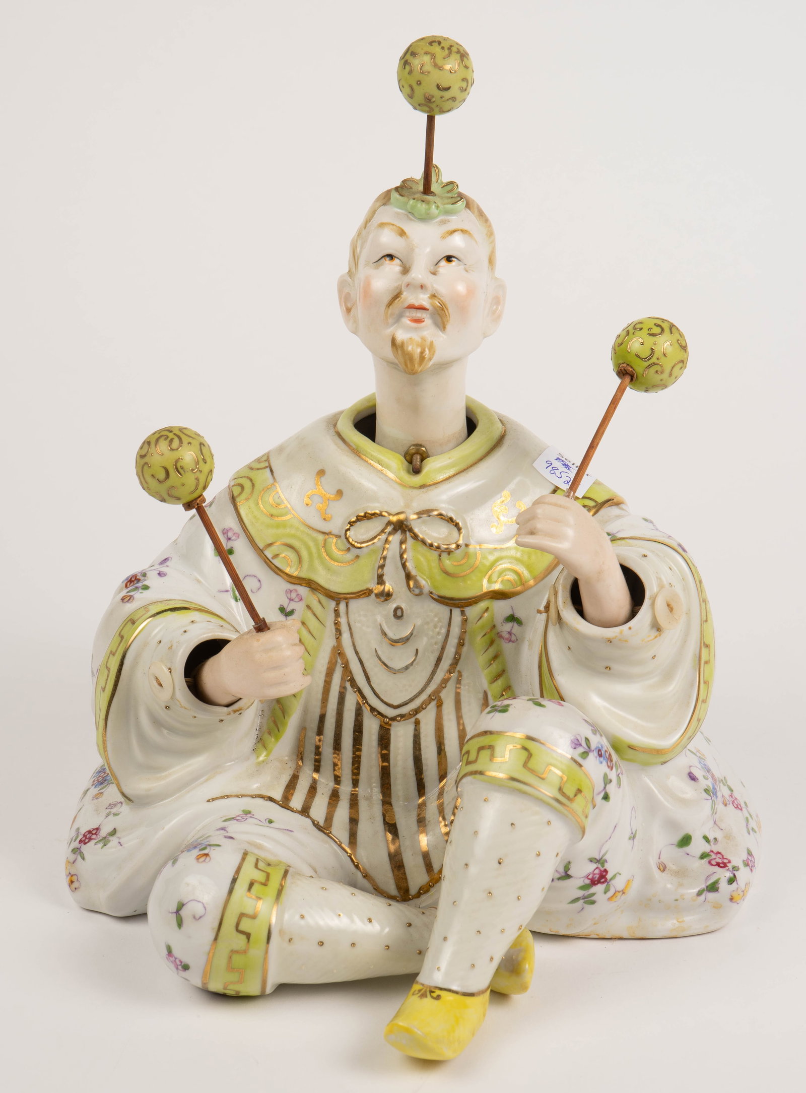 Chinoiserie Nodder Figurine, Possibly German.: It is a male emperor figure holding decorative sticks (one will need some repair to fit back into his left hand). The maker is unknown, but the figure is marked, "G-520" underneath. There is some dust