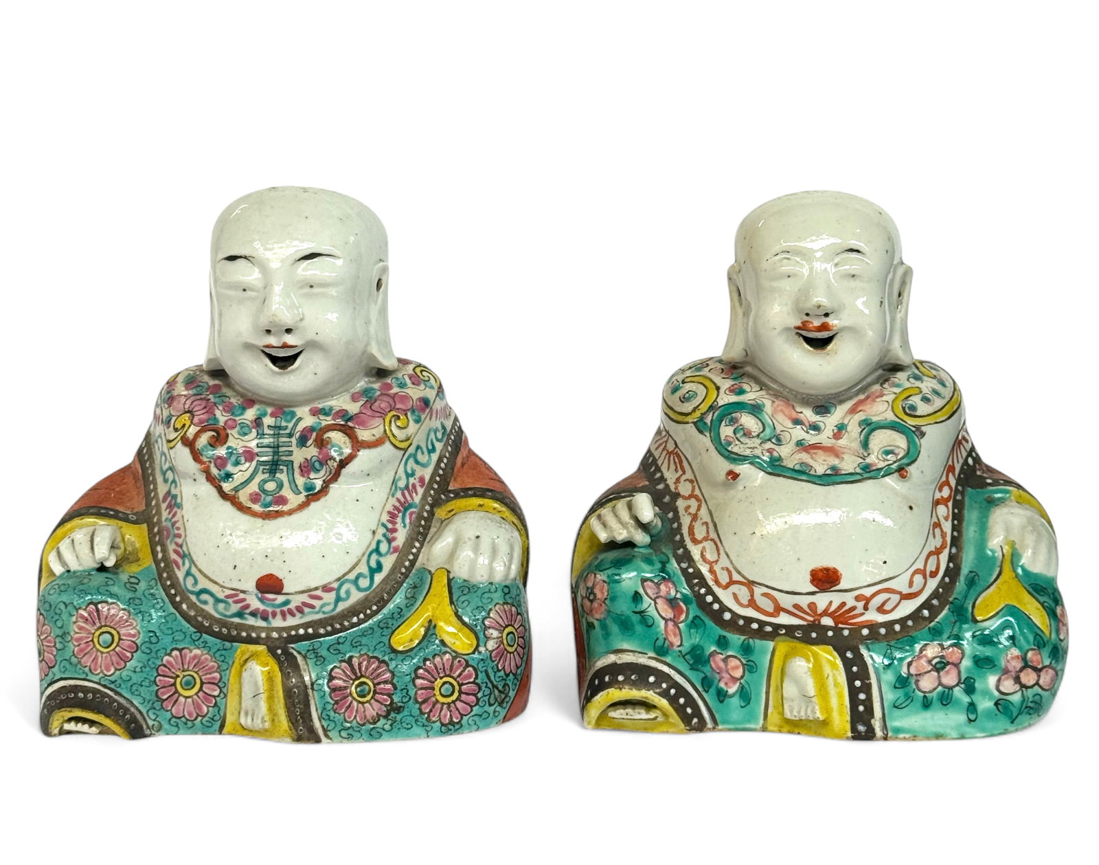 Pair of Old Chinese Famille Rose Figurines of Boys: The seated laughing boys are in good overall condition, but one of them has a crack running about 1 1/2" up from its base. The are hollow on the inside. Each figure measures 6 3/4" tall, 6" wide, and 