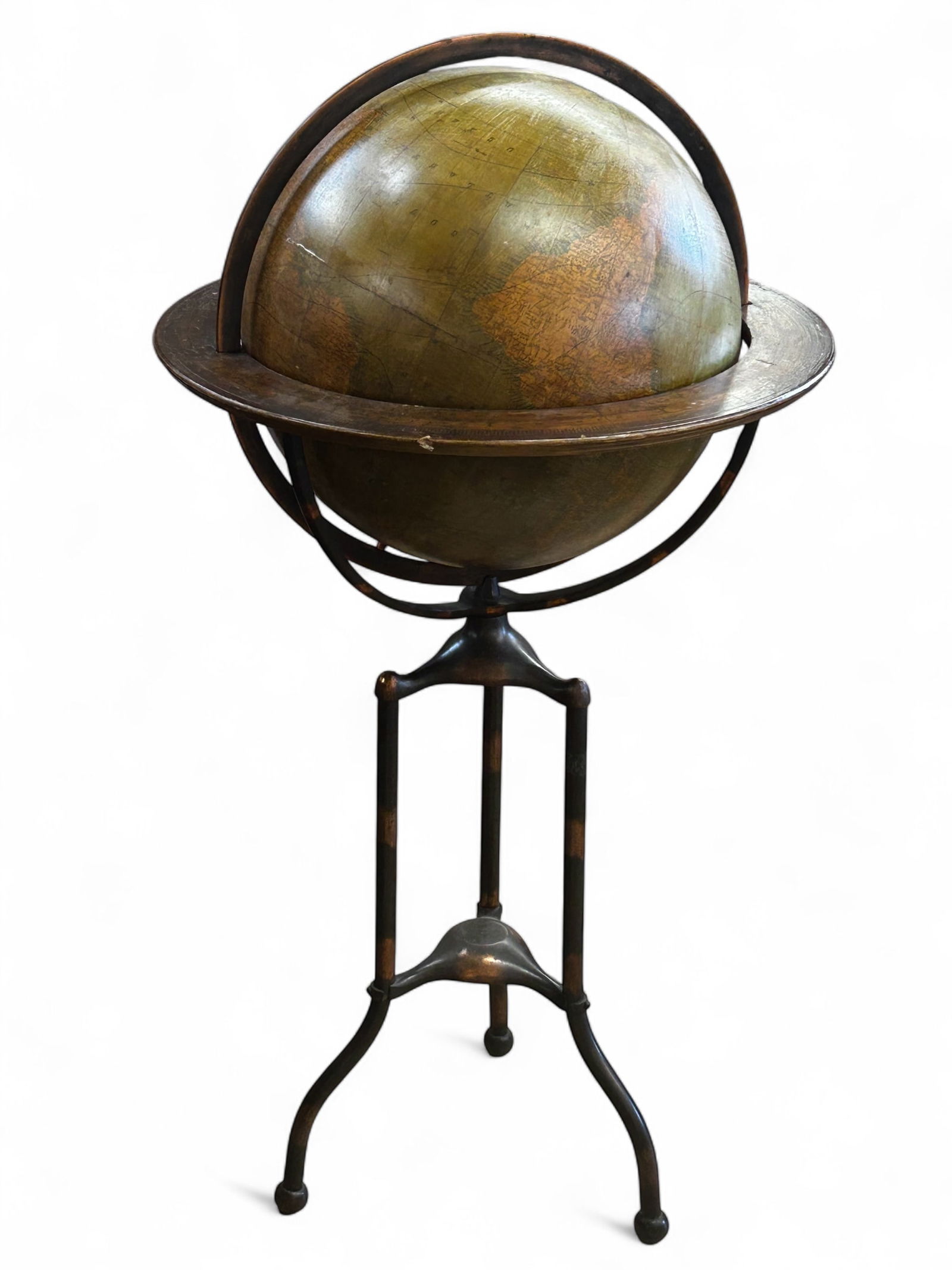 Antique Hammond Terrestrial Globe on Stand.: The antique paper wrapped globe has a brand sticker which reads, "The Hammond Globe C.S. Hammond and Company New York". The piece has a metal stand and hardware with copper or bronze toning, and a woo