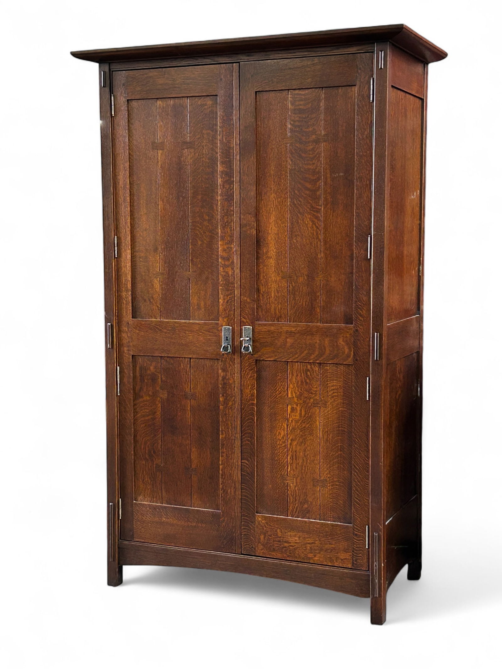 Signed Stickley Oak Mission Arts & Crafts Armoire.: The piece is not vintage, but it is really nice, and in good shape. It has bow-tie type inlaid shapes on the front doors. The interior has segmented shelves for storing linens, and two interior drawer