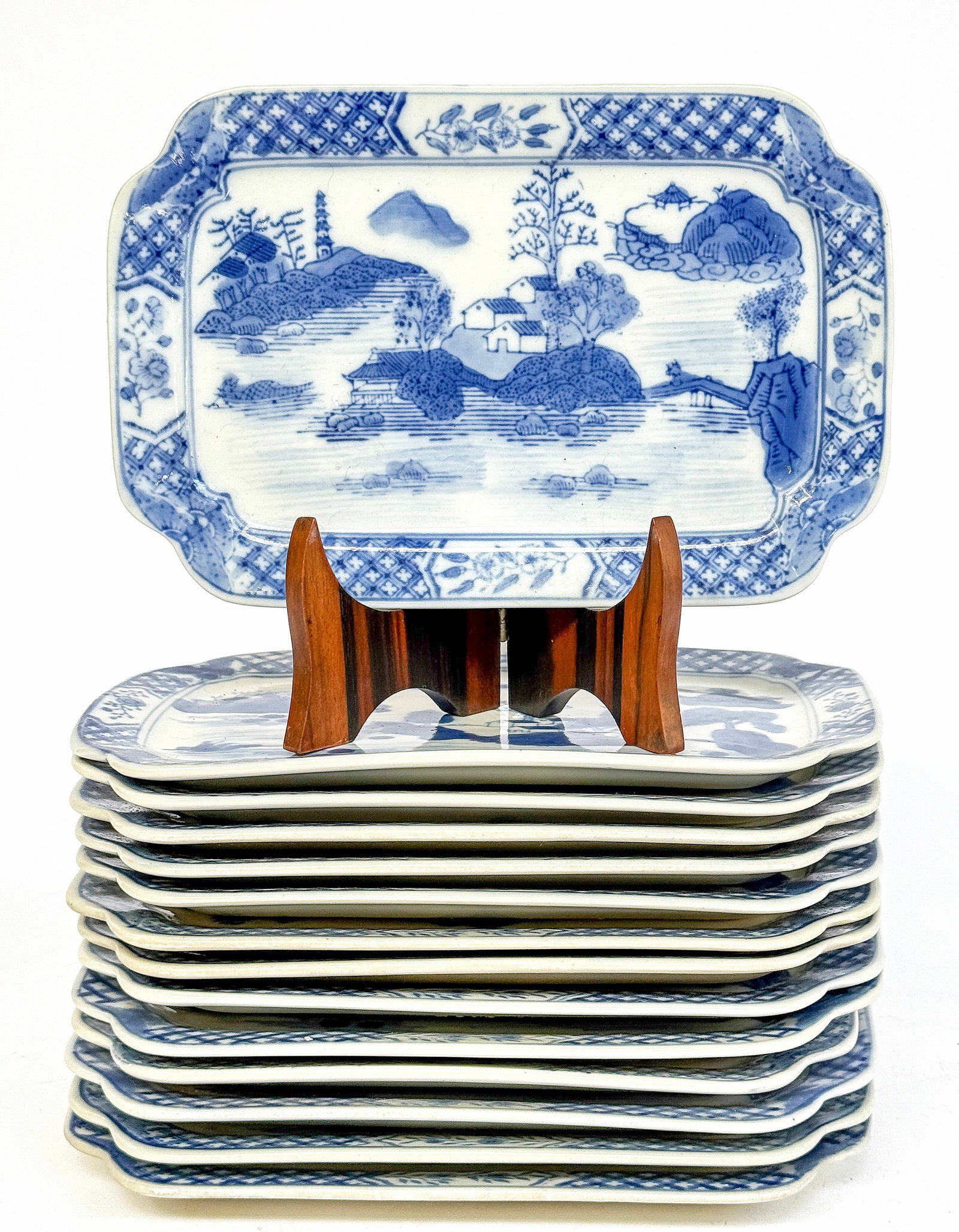 Set of 14 Old Canton Blue & White Chinese Plates.: The rectangular plates are in good overall condition, with wear to use. Each has a mark on its underside. Each plate measures 7 1/2" x 10 1/4". In-house shipping is available. Please see our website r