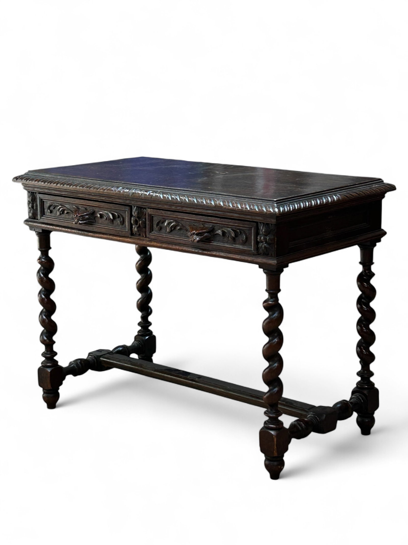 Carved Writing Desk or Table w/ Barley Twist Legs.: The table features barley twist legs, turned wood leg joining pieces, carved trim, and 2 carved drawer fronts, including pulls which resemble bird or animal faces. It measures 29 1/4" x 39" x 21 3/8".