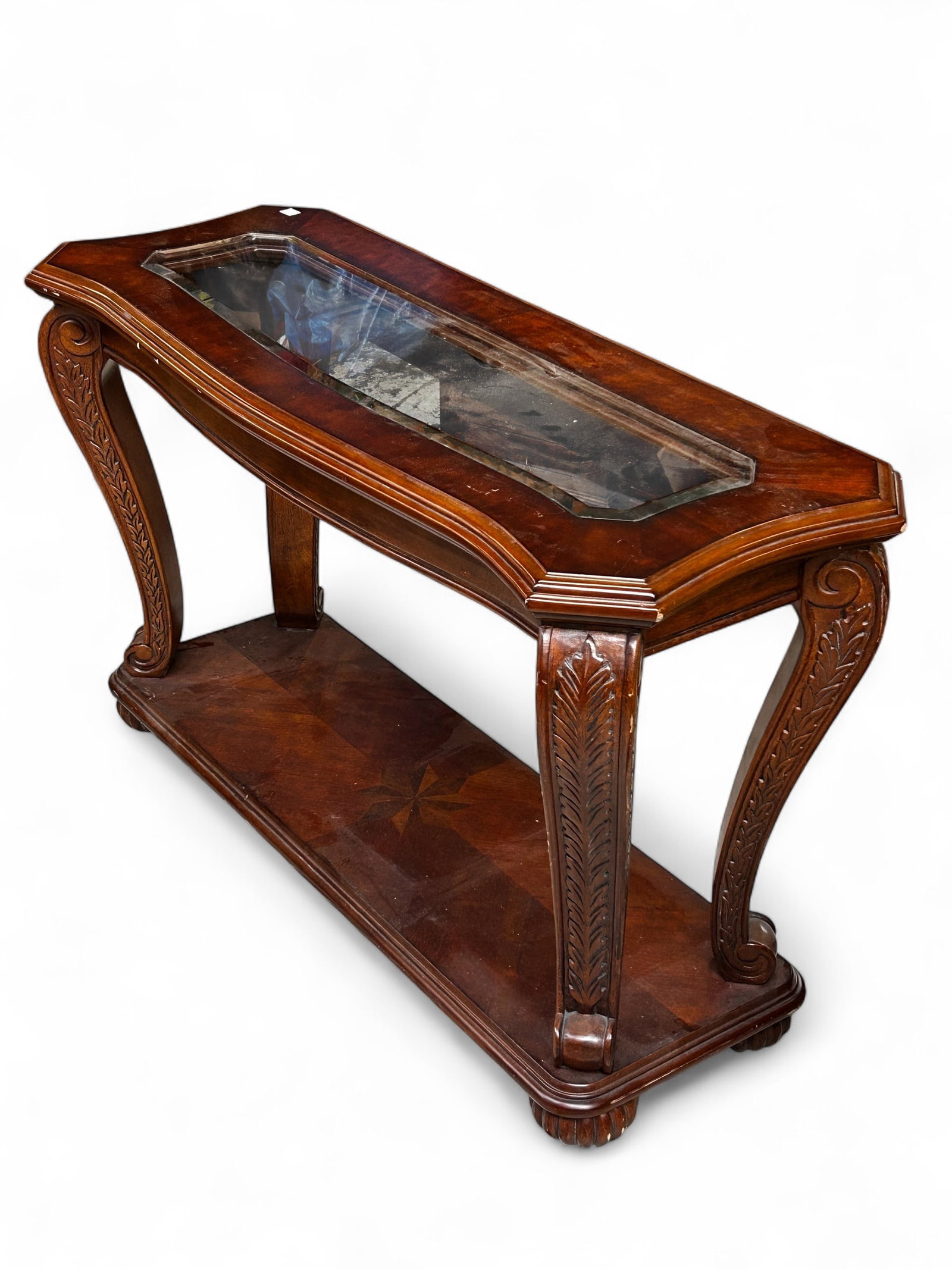 Carved Console or Hall Table.: The top has a bevelled glass insert, and the legs have carvings of acanthus leaves. The lower shelf or base has a parquetry design. There are scratches and scrapes, but overall, the table is in good s