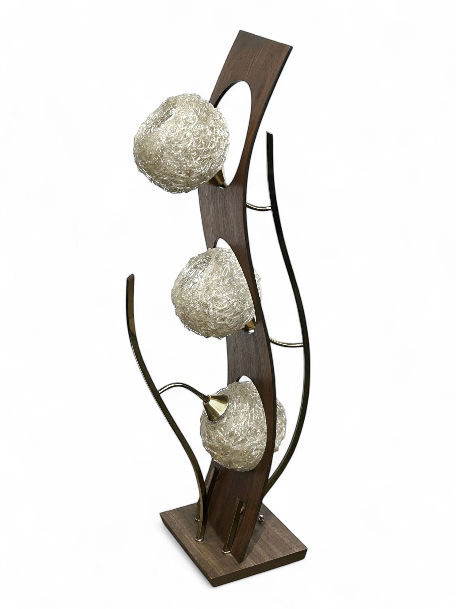 Mid Century Modern Bentwood Spaghetti Lucite Lamp.: This vintage MCM lamp features a vertical bentwood wave design, with 3 lights held by curved brass posts on either side. The lights have spherical spaghetti lucite shades. The lamp measures 42 3/4" x