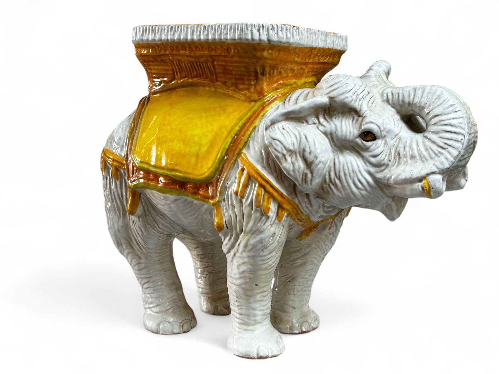 Elephant Garden Stool.: This painted garden stool has some small chips, but overall, it is in good condition. It measures 21" wide, 8" deep, and 17" tall. Third-party freight shipping or personal pickup is required. Please s