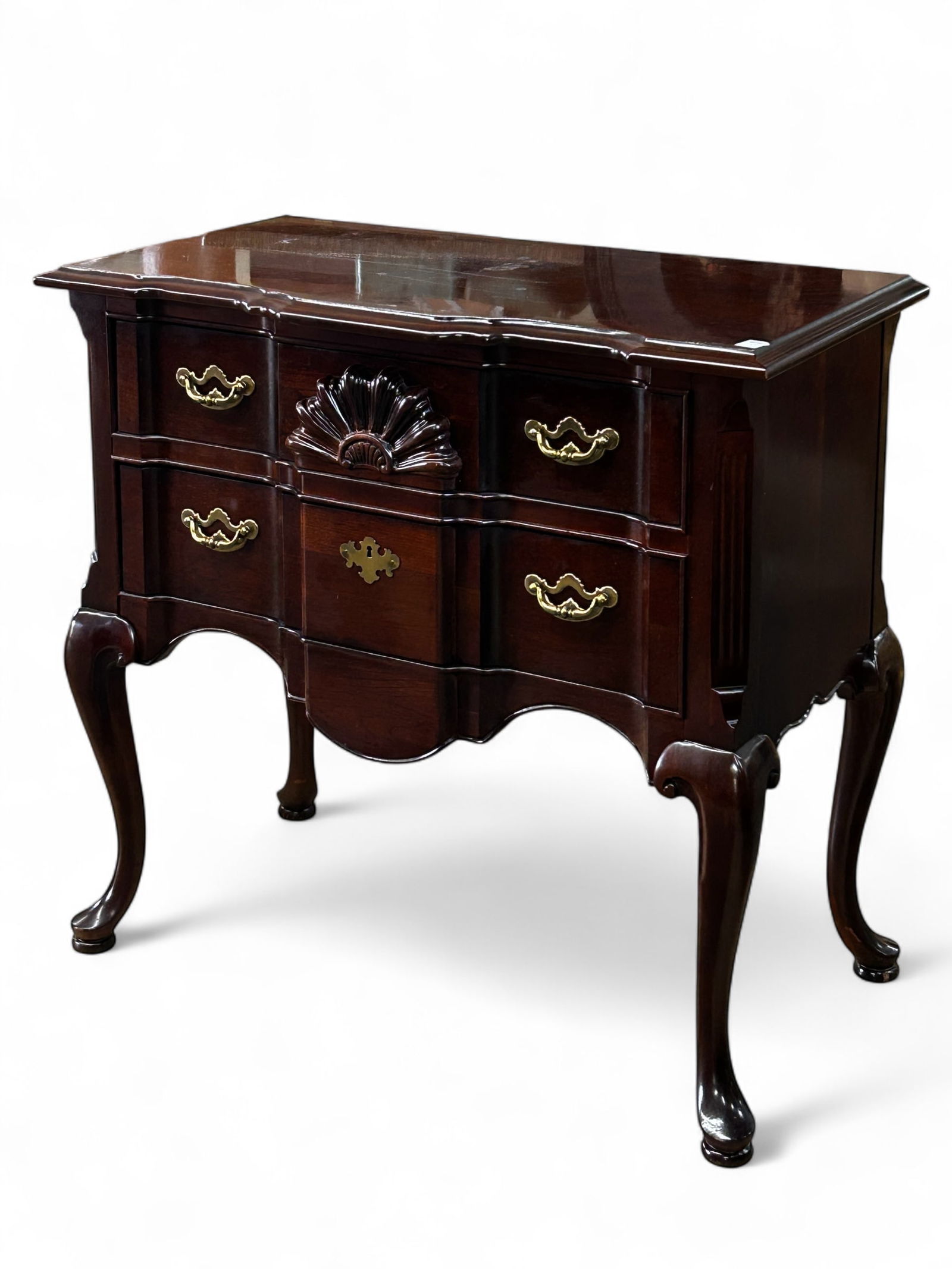 Thomasville Queen Anne Style Server.: This vintage server has carved fan details, bevelled sides, and two drawers with brass hardware. There are some scratches, and a few small white spots, but overall, the piece is in good condition. It