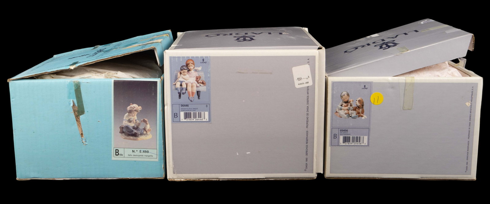 Lot of 3 Lladro Figurines- Chidren & Dogs.: This lot includes the following: "Surrounded by Love", "New Playmates", and "I Hope She Does". They look to be in very good condition, and come with the original boxes. The largest figure measures 5 1