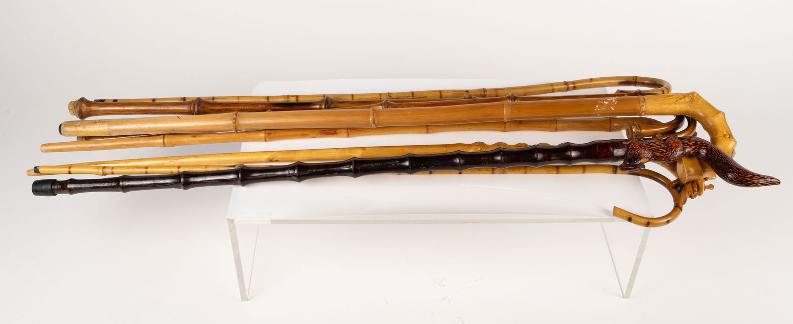 Lot of 8 Bamboo Canes & Walking Sticks.: They may be vintage. There are some scratches and signs of wear, but overall, the lot looks to be in good condition. The largest one measures 39" tall, 5 1/2" wide, and 1 1/4" deep. The smallest one m