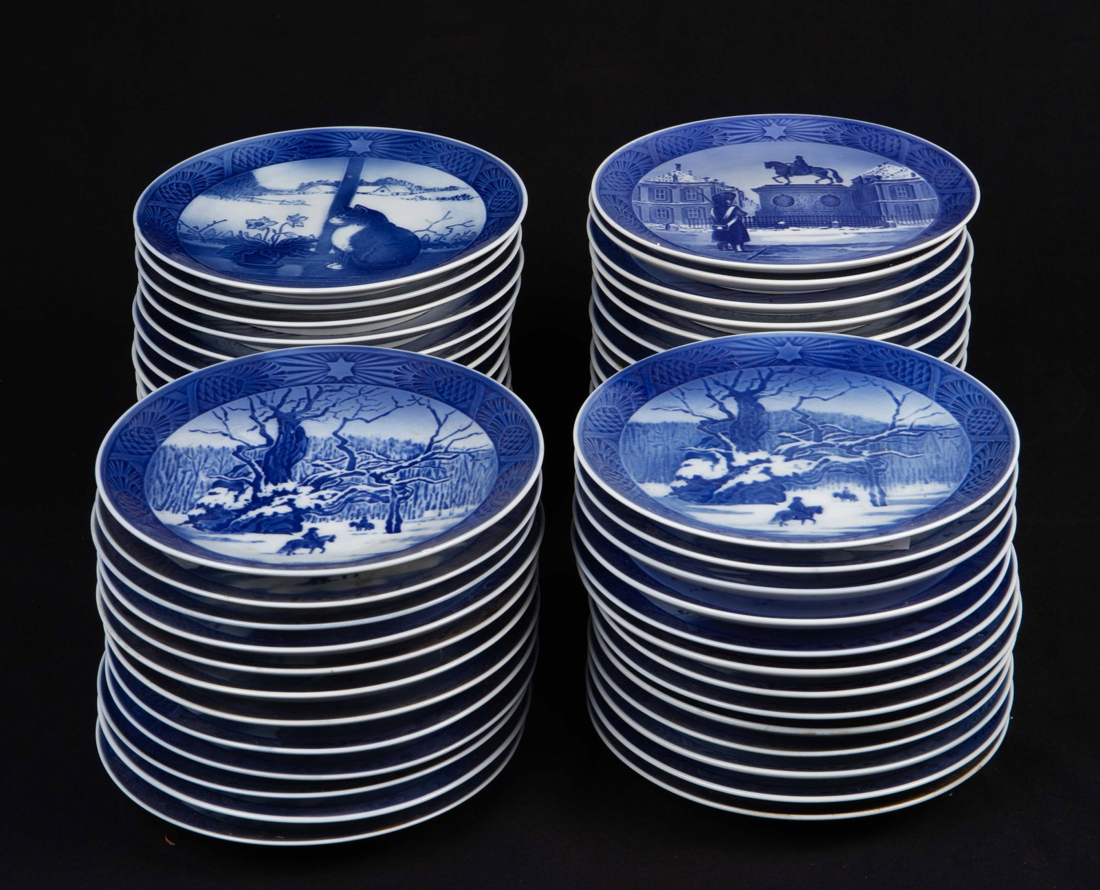 Lot of Royal Copenhagen Year Plates, 1954 Onward.: The lot contains 55 Royal Copenhagen year plates from the 1950's - 1990's, with some repeats. The plates may have some scratches. Otherwise, the lot is in overall good condition. Third-party shipping 