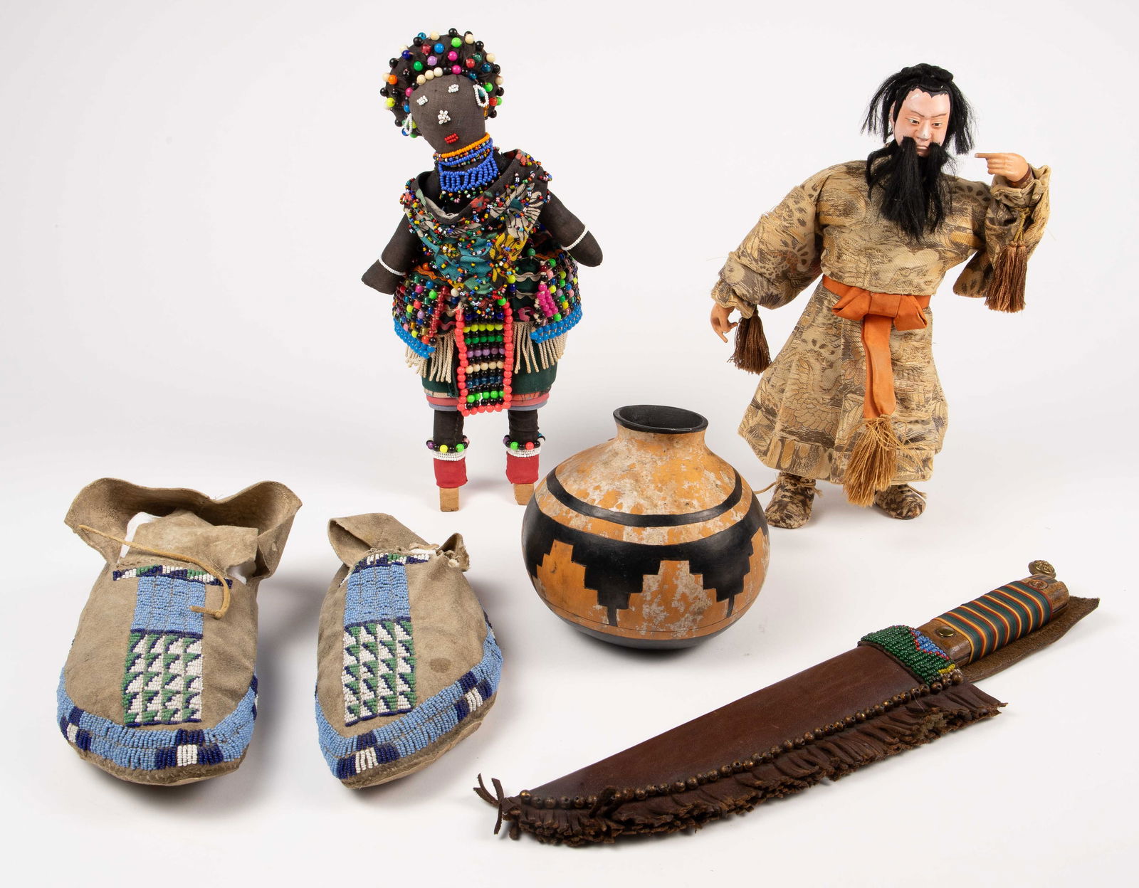 Lot: Beaded Moccasins, Knife w/ Sheath, Dolls. (1 of 9)
