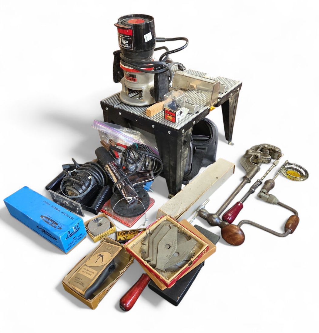 Large Lot of Woodworking Tools and More.: This lot contains a Craftsman 1 1/2 Horsepower Router and Router Table, and a Black and Decker 1 Horsepower Basic Router. Also included is a bag of router bits and tools, some vintage automatic screwd