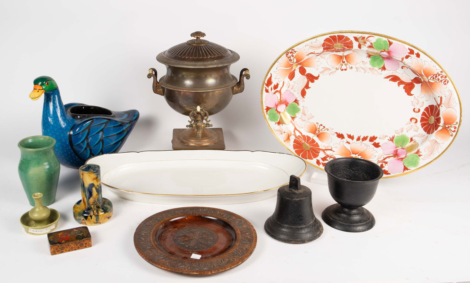 Lot: Pottery, Samovar, Platters - Mary Nohl & More: The lot contains 10 items. There is a hand painted ceramic duck planter or vase by M. Palacios Mexico, a bud vase by Pigeon Forge pottery, a blue / beige vase with a figure by Mary Nohl, and a green v