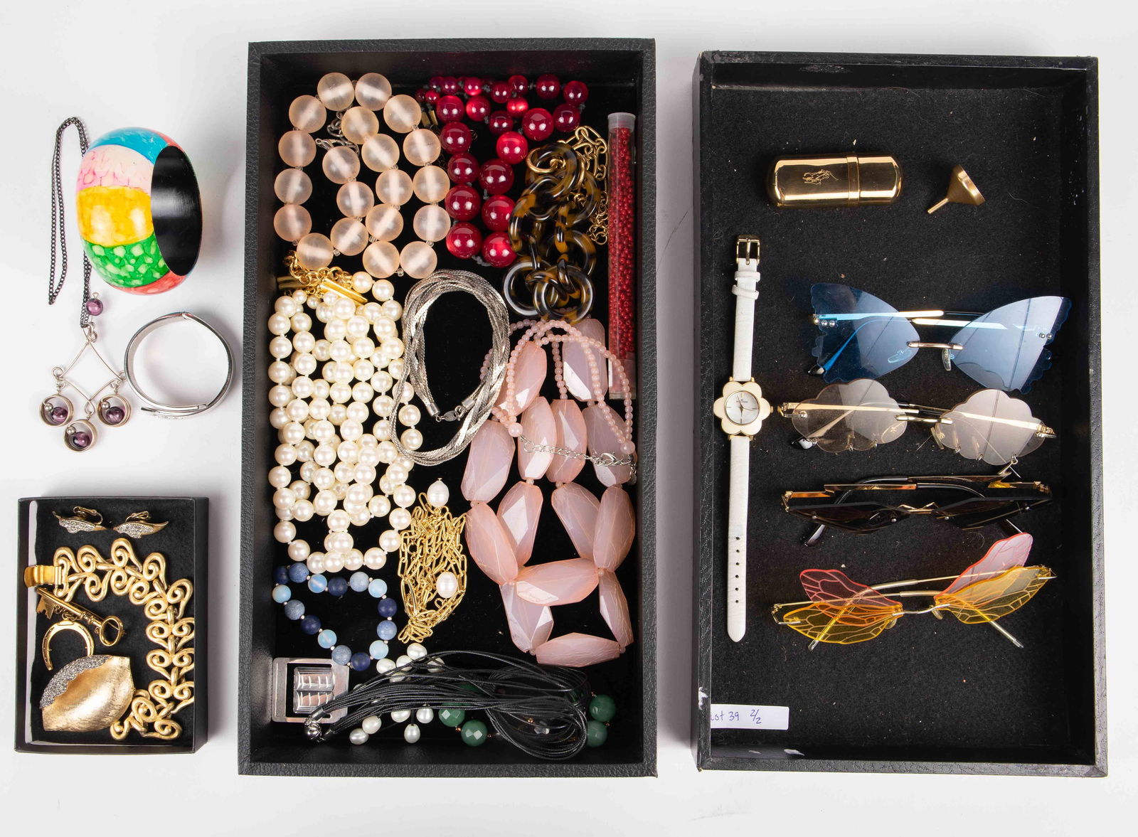 Lot of Costume Jewelry & Fashion Sunglasses.: The lot contains over 20 items, mostly jewelry. Some of the stand out pieces are: an Erwin Pearl bracelet, a Coro brooch, a Carolee necklace, and a crown Trifari brooch and earring set. The lot also i