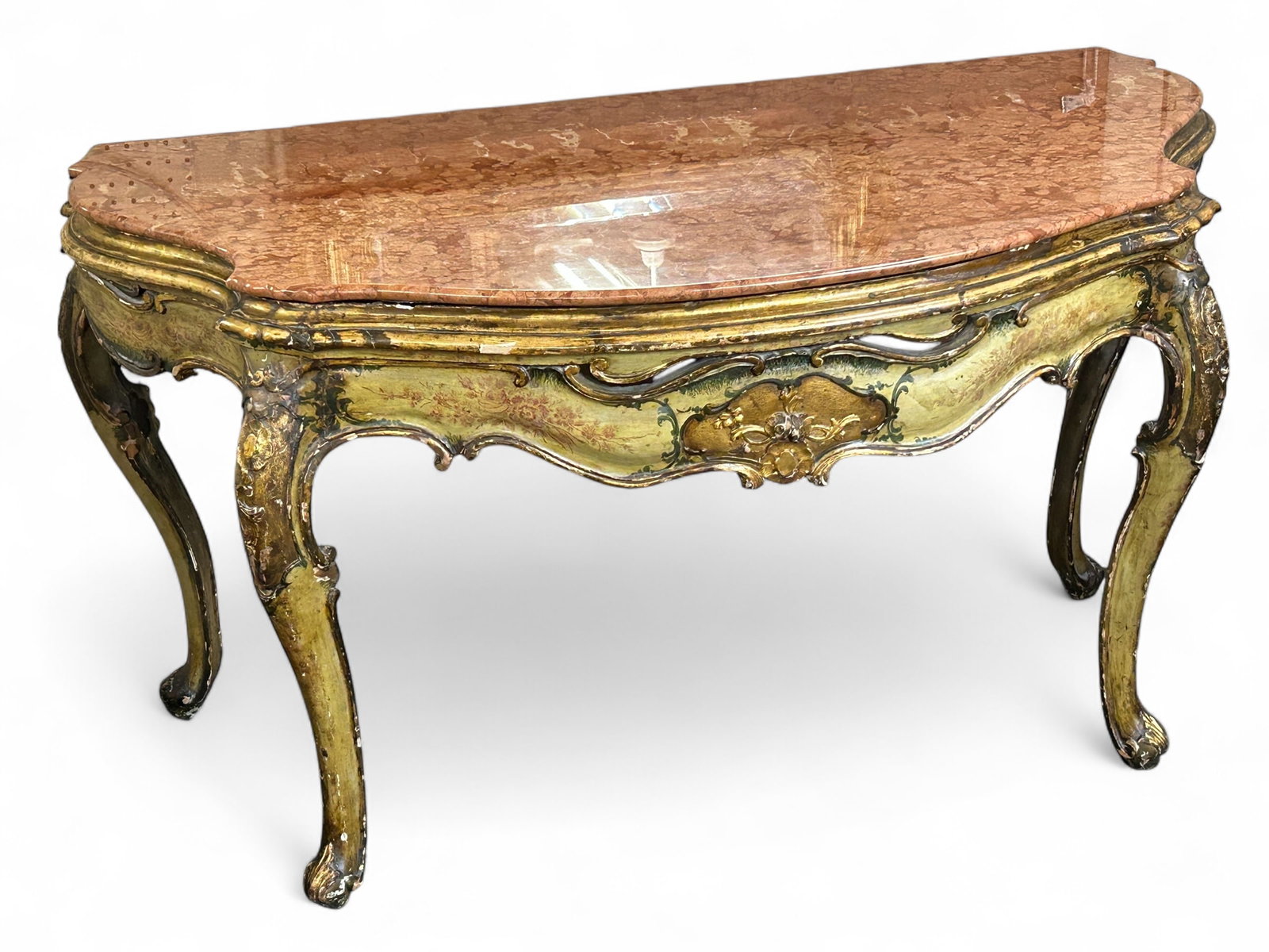 Italian Marble Top Gilt & Painted Console Table.: This Italian console table has a marble top, and is painted. It features carved cabriole legs and a pierced apron. It shows a lot of wear, with many chips in the paint. The top is in nice shape. The t