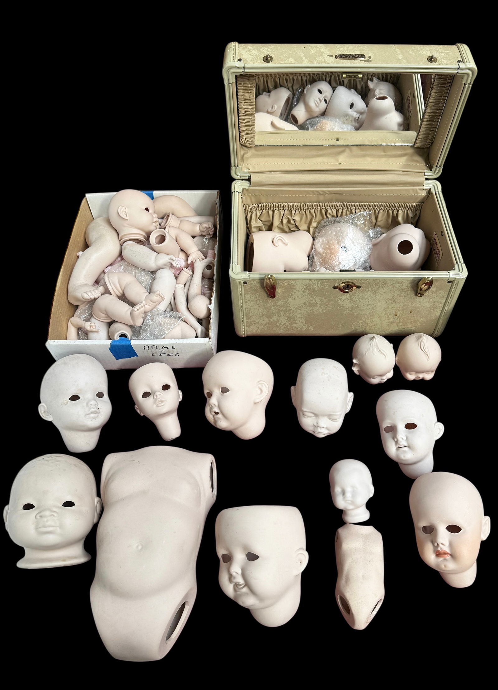 Lot of Bisque Porcelain Doll Parts.: The lot includes torsos, heads, legs, and arms. Some of the brands observed are Heubach Hoppelsdorf Germany, Grace S. Putnam Germany, S.F.B.J. Paris, J.D.K. Germany, Dot, 1894 A.M.D.E.P. Germany, Fash