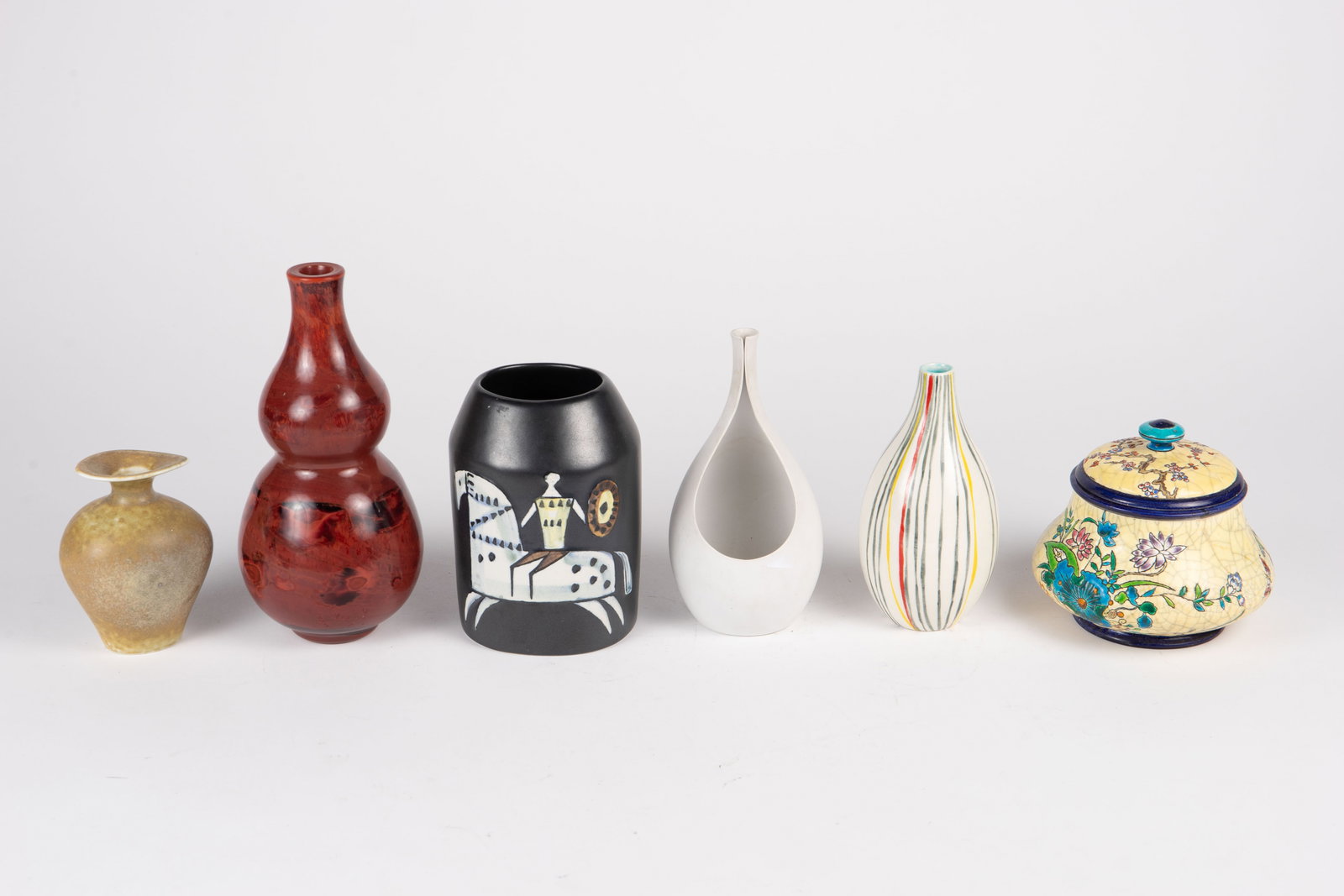 Lot: Gunnar Nyland Rorstrand, Fantoni Vase, etc.: This lot includes the following pieces: a Gunnar Nylund for Rorstrand 5" vase, a Marcello Fantoni for Raymor 7" striped vase, a Lisa Larson for Gustavsberg Sweden pictorial vase, a Stig Lindberg for G