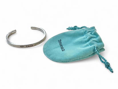 Tiffany & Co. 1837 Sterling Silver Cuff Bracelet.: The lot consists of a Tiffany & Co. sterling silver cuff bangle bracelet which is marked 925 / T&Co / 1837 on the front, and Tiffany & Co. 925 inside the band. The bangle measures 2 1/8" across the
