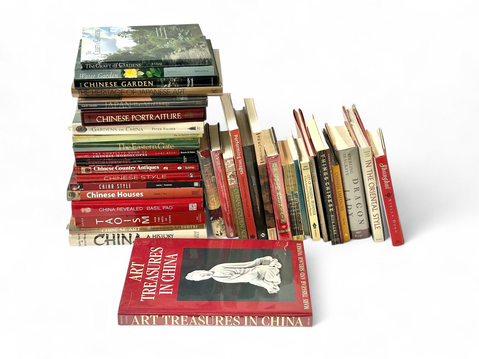 37 Books - Chinese Architecture, Art, & More: The lot contains 37 coffee table and regular sized books mostly about China, Chinese art, architecture, gardening, government, and more. Some of the titles included are Asian Art, China Revealed, Impe