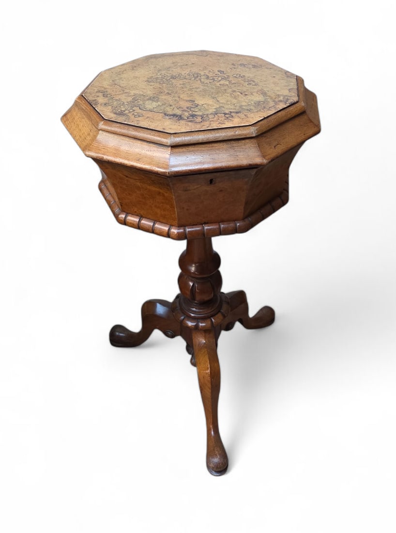 Antique Victorian Burled Walnut Teapoy Tea Table.: The Teapoy has a lockable lift-top (no key included) and removable holders for utensils or teabags, as well as two floral porcelain dishes. It sits on a pedestal stand with three cabriole legs. One of