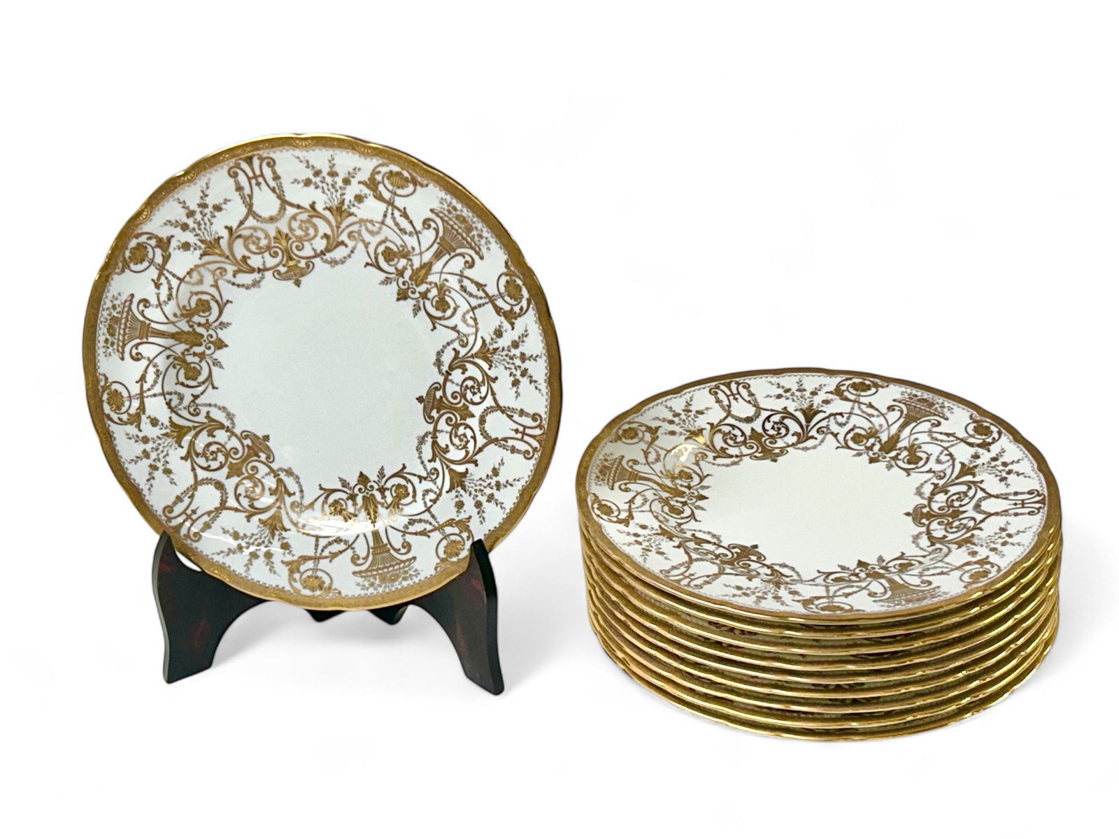 Set of 11 Royal Crown Derby Gilded Dinner Plates.: These elaborately decorated plates were made for Burley & Co, Chicago. The set looks to be in very nice condition overall, with only minor utensil scratches. Each plate measures 10 3/8" in diameter. I