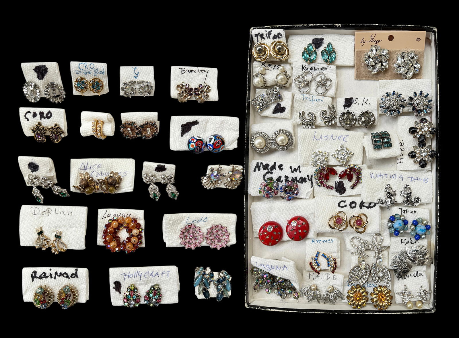 Lot of 45 Pairs of Vintage Costume Earrings, Sgd.: The lot contains 45 pairs of earrings, most of them signed. The pairs have rhinestones, pearls, aurora borealis, metals, and glass. The brands or marks observed are Coro, Hollycraft, Made in Germany,