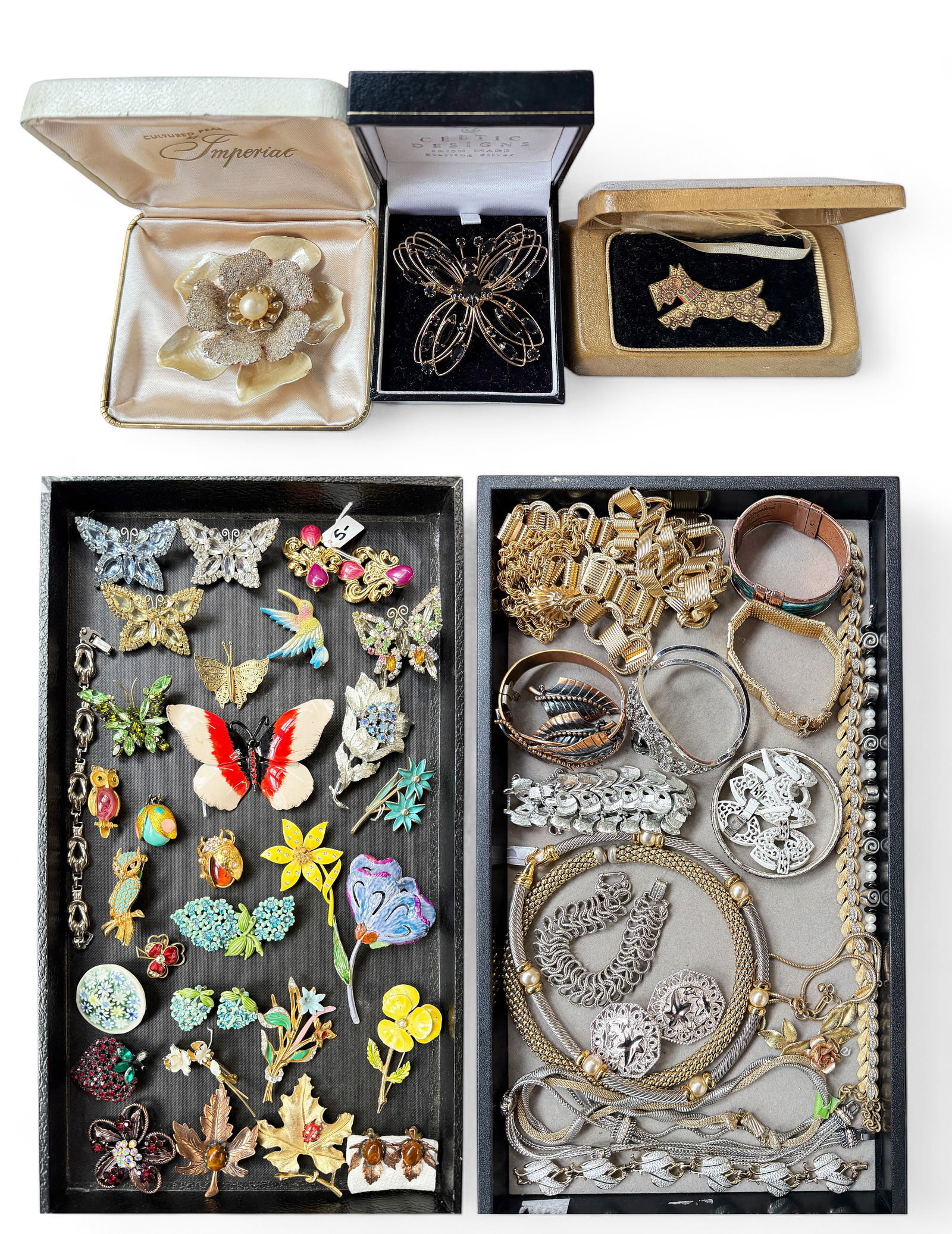 Lot of Vintage Costume Jewelry, inc. Brooches.: The lot contains over 50 pieces of vintage costume jewelry, many of them signed. There are 29 brooches, including butterflies, owls, flowers, ladybugs, a bird, and a dog. There are also bracelets, nec