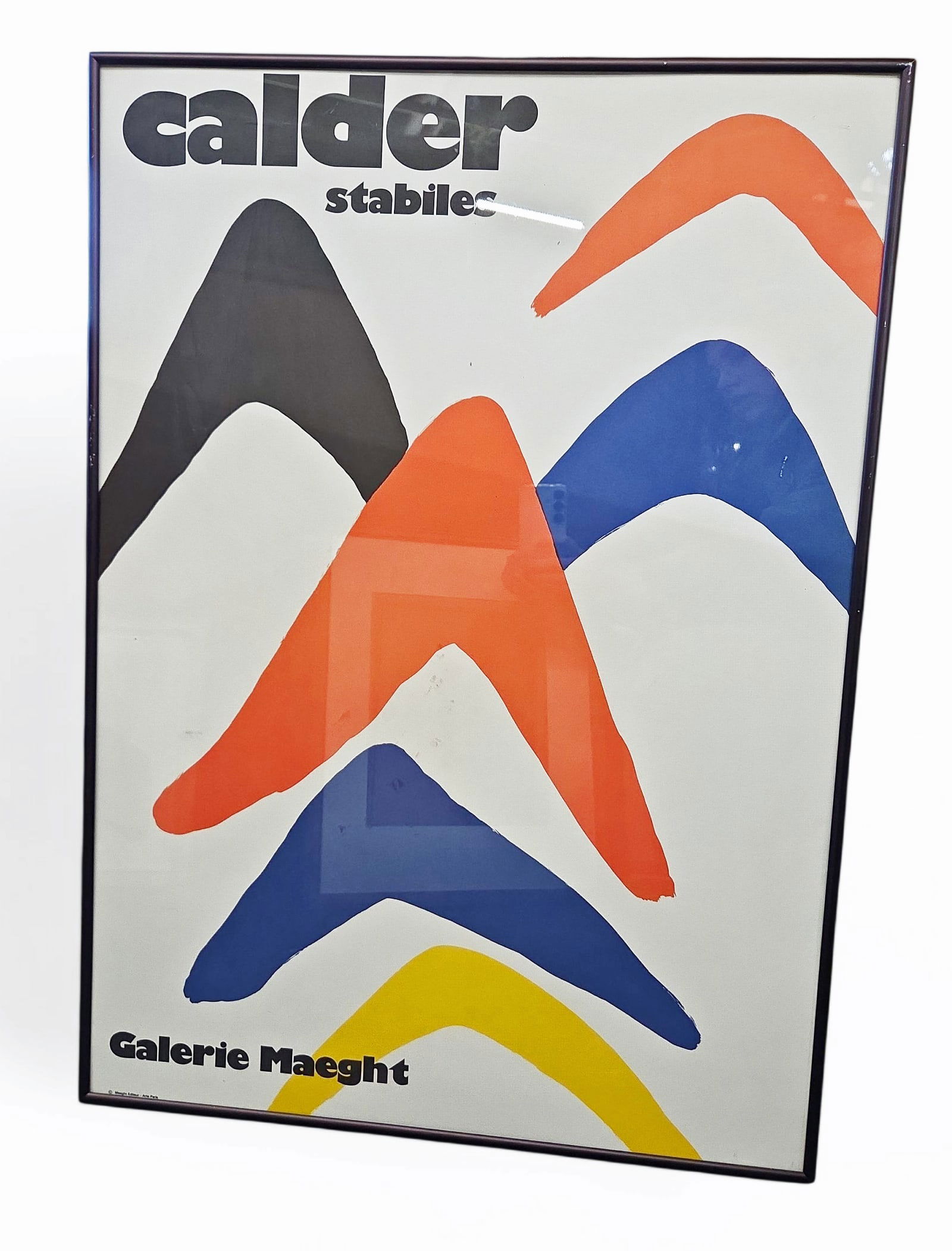 Alexander Calder "Stabiles" Galerie Maeght Poster.: It is framed and protected under glass. The frame has some scratches, and the glass could use some cleaning, but the poster looks to be in good overall condition (see photos). The frame measurements a