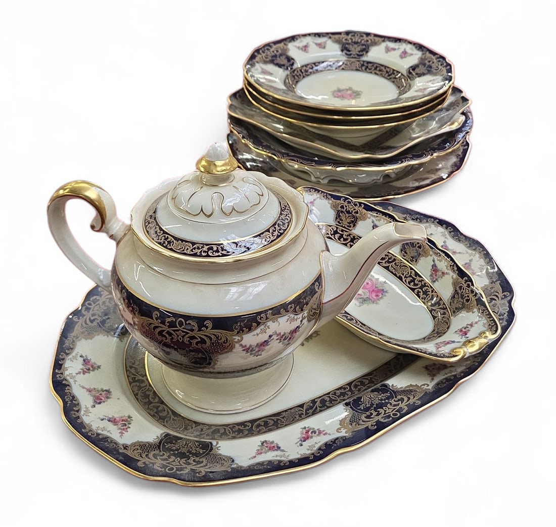 9 Pcs. Hutschenreuther Porcelain, inc. Servers.: The lot contains 9 items of the same design, all marked Hutschenreuther Hohenberg Bavaria on the undersides, along with other marks and numbers. The lot contains 3 dinner bowls, a 12 1/2" round footed
