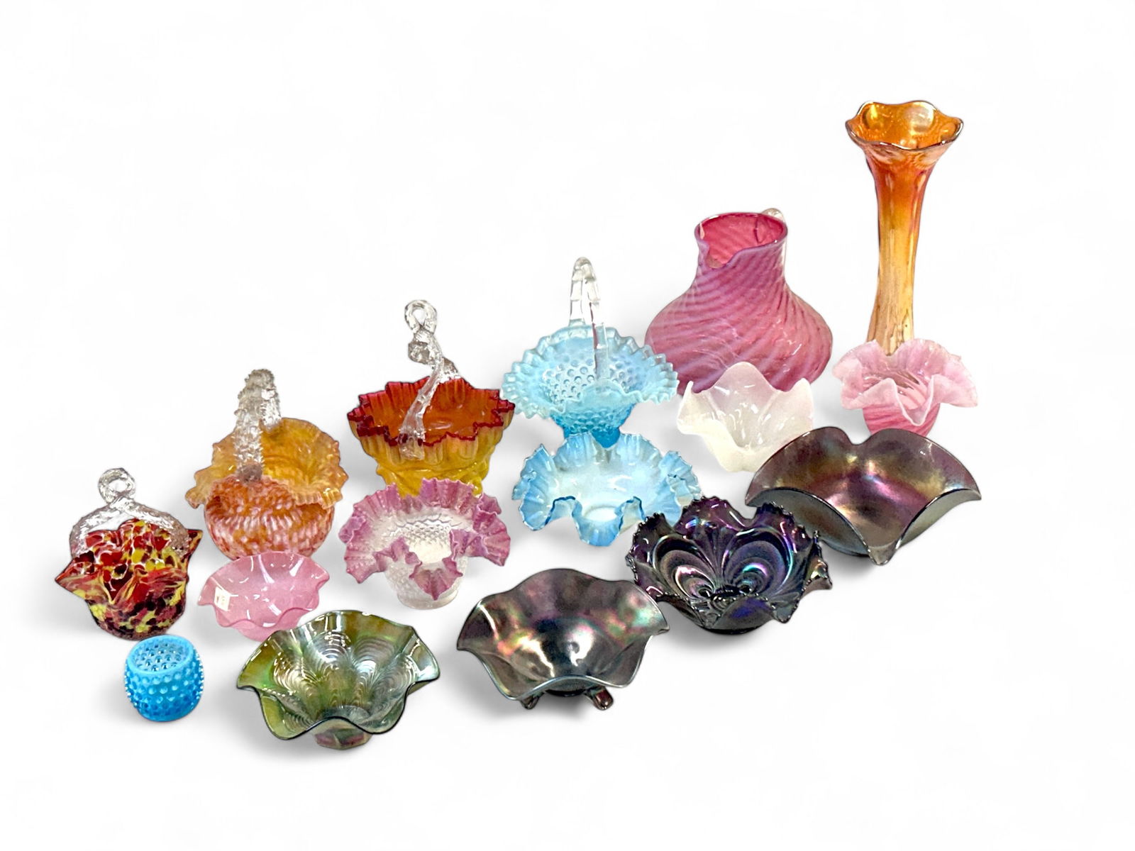 Lot of Art Glass Bowls, Shades, Vase, & Pitcher.: The lot contains 16 items. The glass styles used in the lot are hobnail, baskets, ruffled edges, handkerchief, iridescent, candy cane, and more. The baskets with spiky handles are likely by Czech bohe