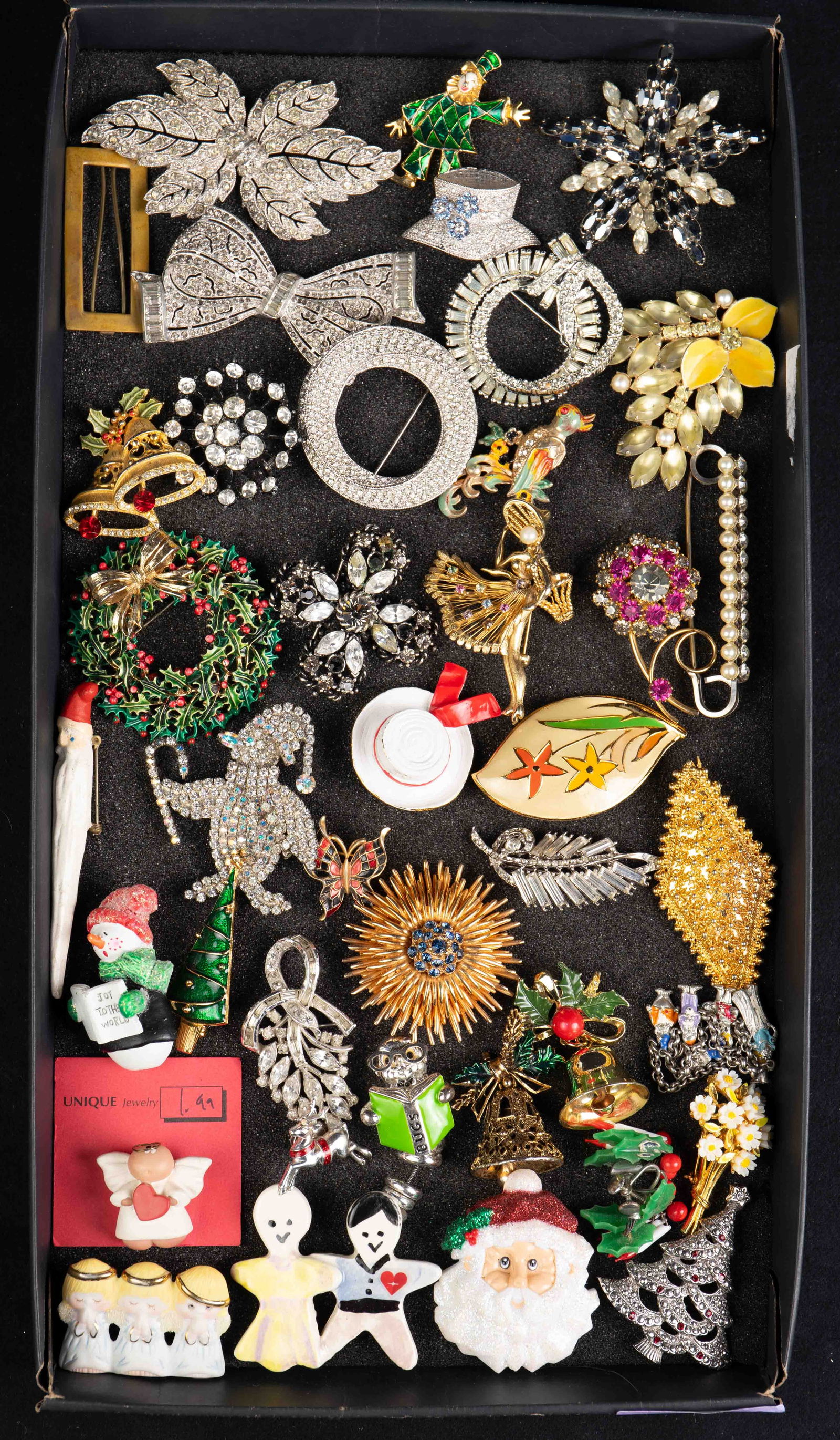 Lot of Costume Brooches inc. Christmas - Brooks.: The lot contains 40 items. There are 38 brooches, a WD Seven Dwarfs charm bracelet, and a pair of Christmas earrings. The brands or marks observed on the brooches are: Brooks, Trifari, Accesocraft, Av