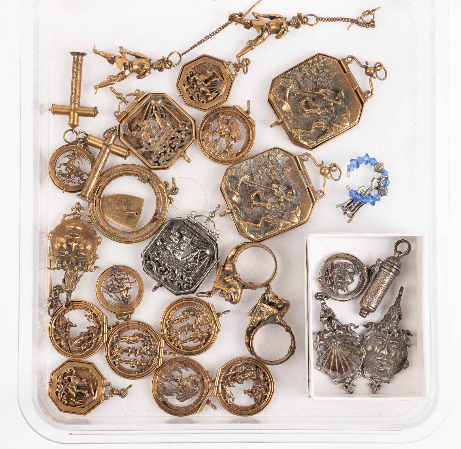 Lot of Watch Fobs - Sun Dials, 925, Brass.: The lot contains 27 items. Most of the items are portable pocket sundials or watch fobs, with pierced high relief decorative covers. There are also a couple of ring dials, and shepherd's pillar dials,