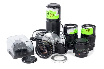 Canon AE-1 Camera with Lenses and Accessories.