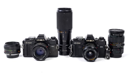 Two Minolta X-700 Cameras with Lenses.