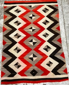 5' 1" x 7' 4" Turn of the Century Navajo Rug.