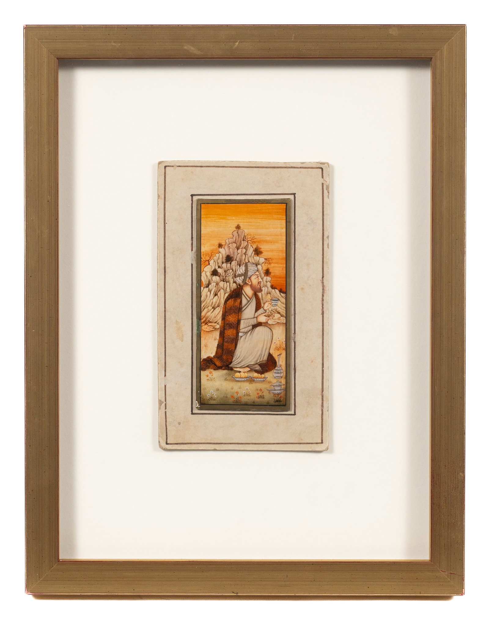 Mughal Style Miniature Painting of Lone Figure.: This work depicts a seated man drinking tea, mounted to a card stock backing. Paperwork: N/A Condition: The edges of the work and its backing are worn. There is also minor wear to the frame's corners.