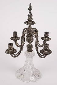 American Brilliant Period Cut Glass Candelabra.: The cut glass base has some small nicks, and there is some dust in the crevices. The silverplate candle holders have some tarnish, and a little wax residue. It is a little wobbly at the point of attac