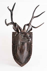 Bronzed Metal 7 Point Deer Bust Wall Mount.: The hunting wall decor depicts a 7 point deer bust mounted on a shield. It measures 36" x 20 1/2" x 18". There are some scratches and stains on the item. Otherwise, it is in overall good condition. Th