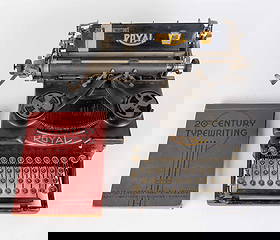 Antique Royal Typewriter w/ Typing Book.: The typewriter is untested, and displays some signs of age-related wear. It has bevelled glass panes on the sides. The book is "20th Century Typewriting". The typewriter measures 15" x 14 1/2" x 9 3/4