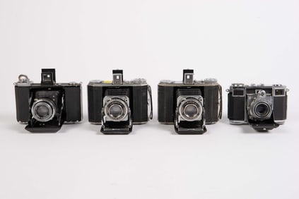 Lot of Four Vintage Folding Cameras.