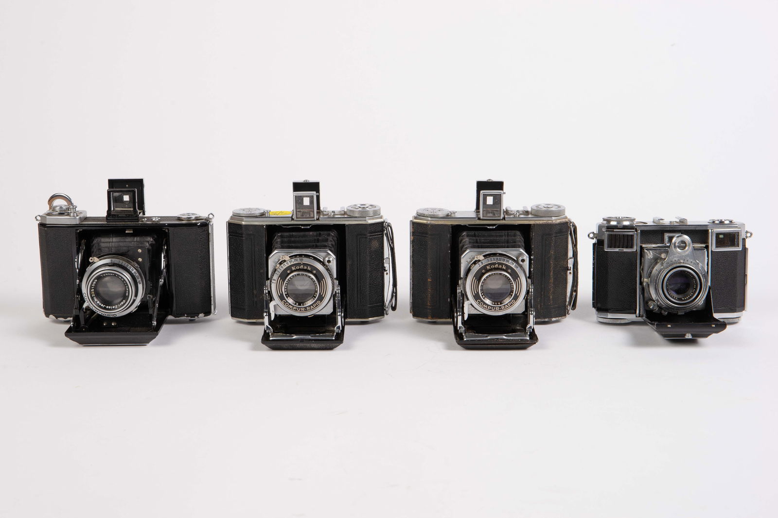 Lot of Four Vintage Folding Cameras. (1 of 4)