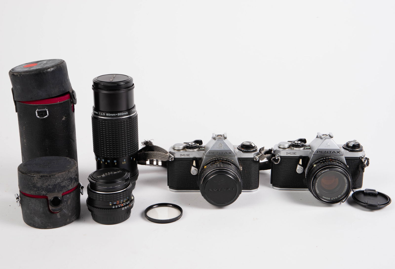 Two Pentax ME Cameras with Four Pentax Lenses. (1 of 7)