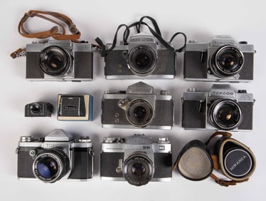 Lot of Topcon and Miranda SLR cameras.