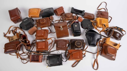 Large Lot of Leather Camera Cases.