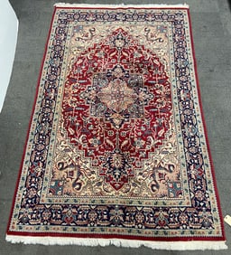 6' 2" x 9' 8" Tabriz Rug.