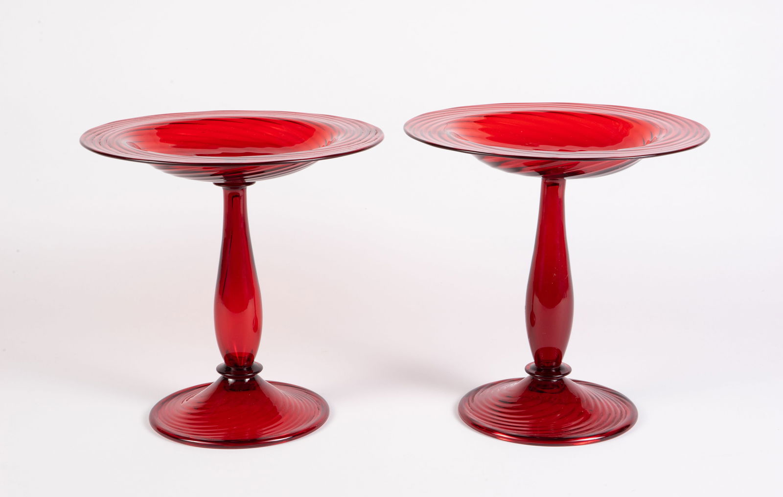 Pair of Steuben Selenium Red Swirl Glass Tazzas. (1 of 3)