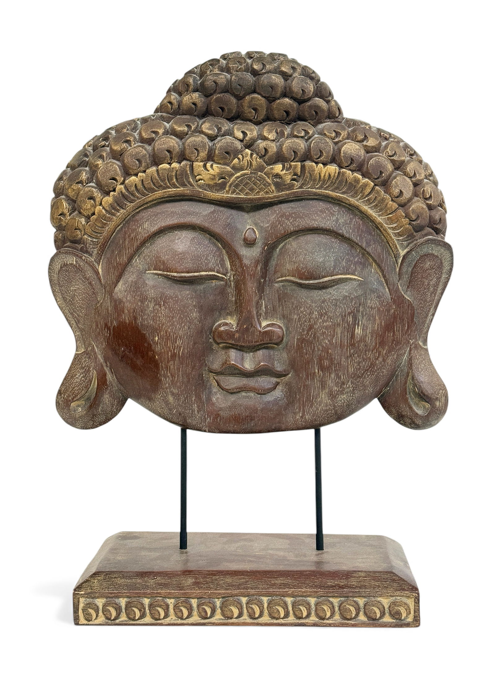 Carved Wood Asian Buddha Head.: The head is suspended above a wooden base. It looks to be in good overall condition, with wear to use. The base and head measure 20 1/8" tall, 14 1/2" wide, and 5 1/2" deep. In-house shipping is avail
