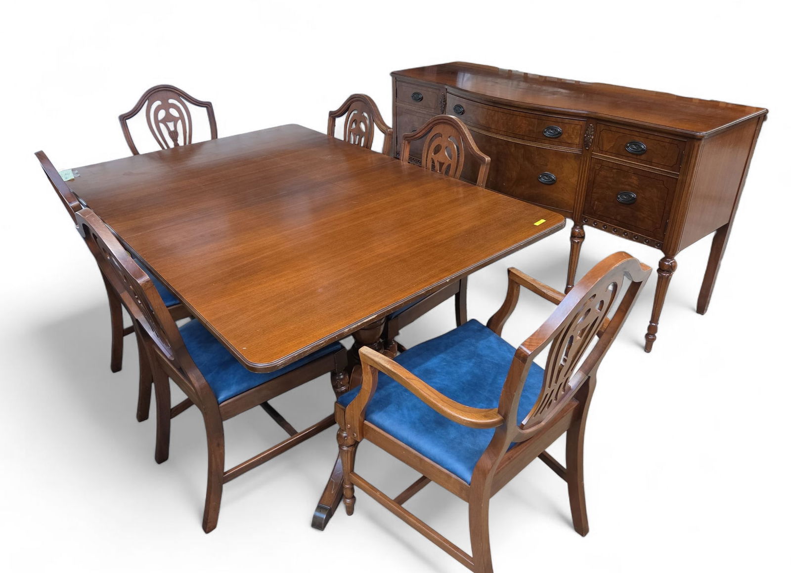 Duncan Phyfe Style Mahogany Dining Set.: This set includes a table, three leaves, six chairs, and a buffet. The table has a pedestal base and six flared legs with brass toe caps. The chairs have shield backs and blue vinyl seats (one has arm