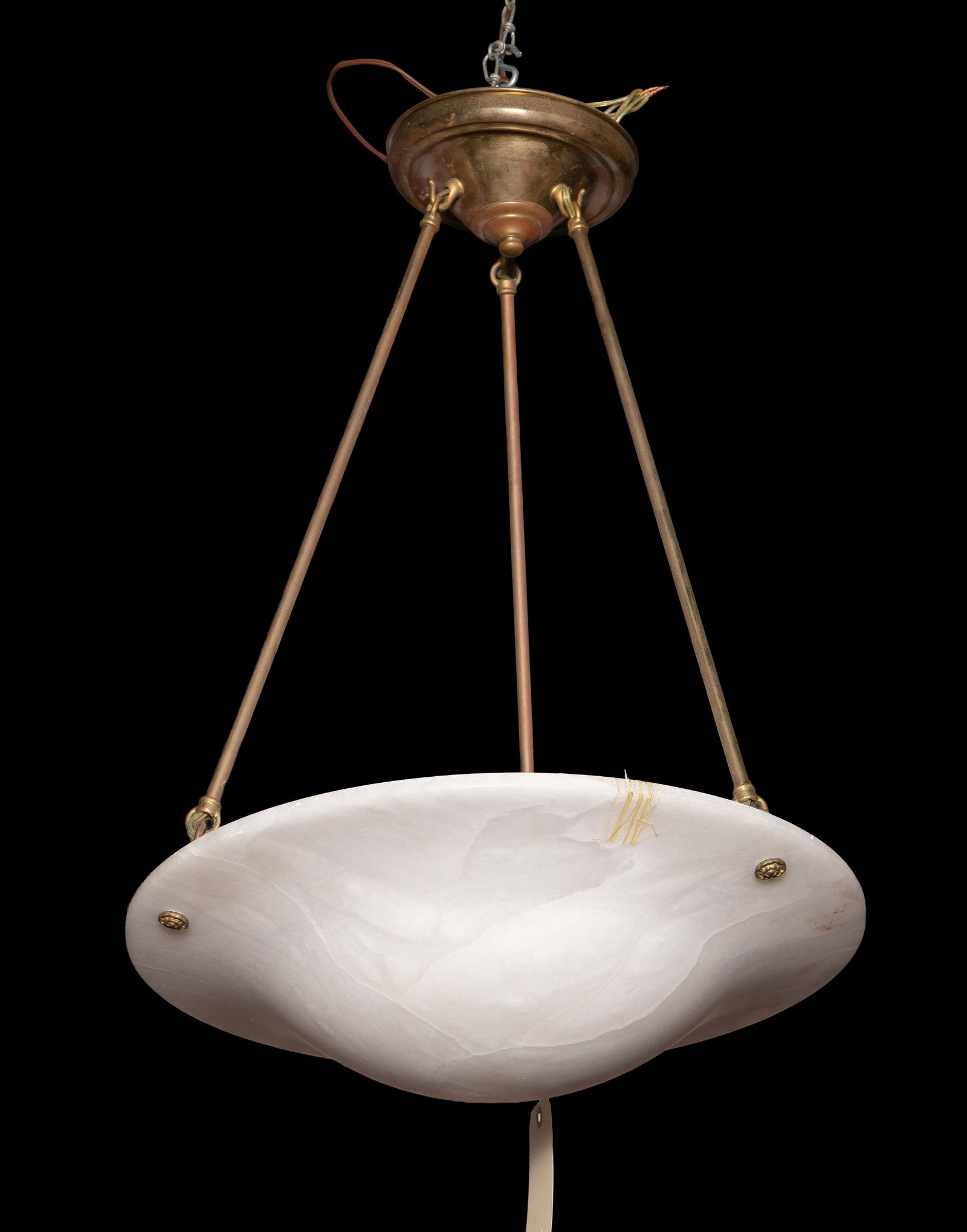 Art Deco Alabaster & Brass Pendant Light: The vintage 3-light pendant light has a bowl shaped white alabaster shade and 3 brass posts which connect it to the ceiling mount. The posts are attached with floral brass hardware. It measures 27" x