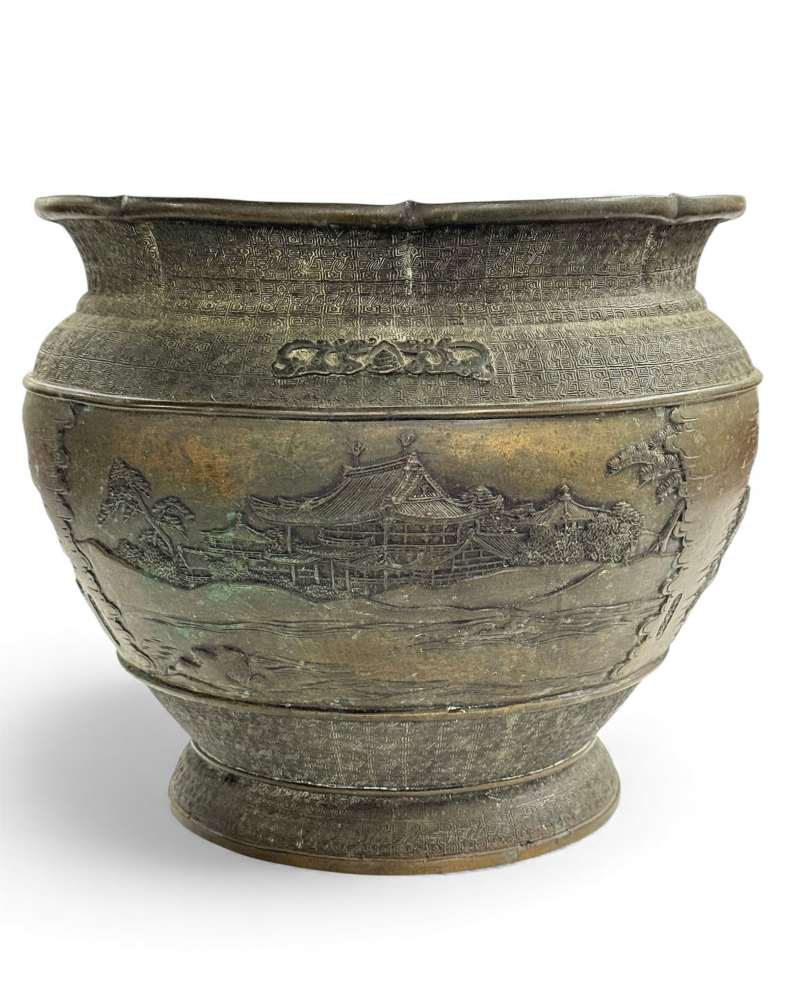 Japanese Bronze Meiji Period Jardiniere.: This intricate bronze jardiniere is signed on the sides as well as on the bottom. It has a few white spots in the crevices, but is in good overall condition. It measures 9 7/8" tall and 11" in maximum